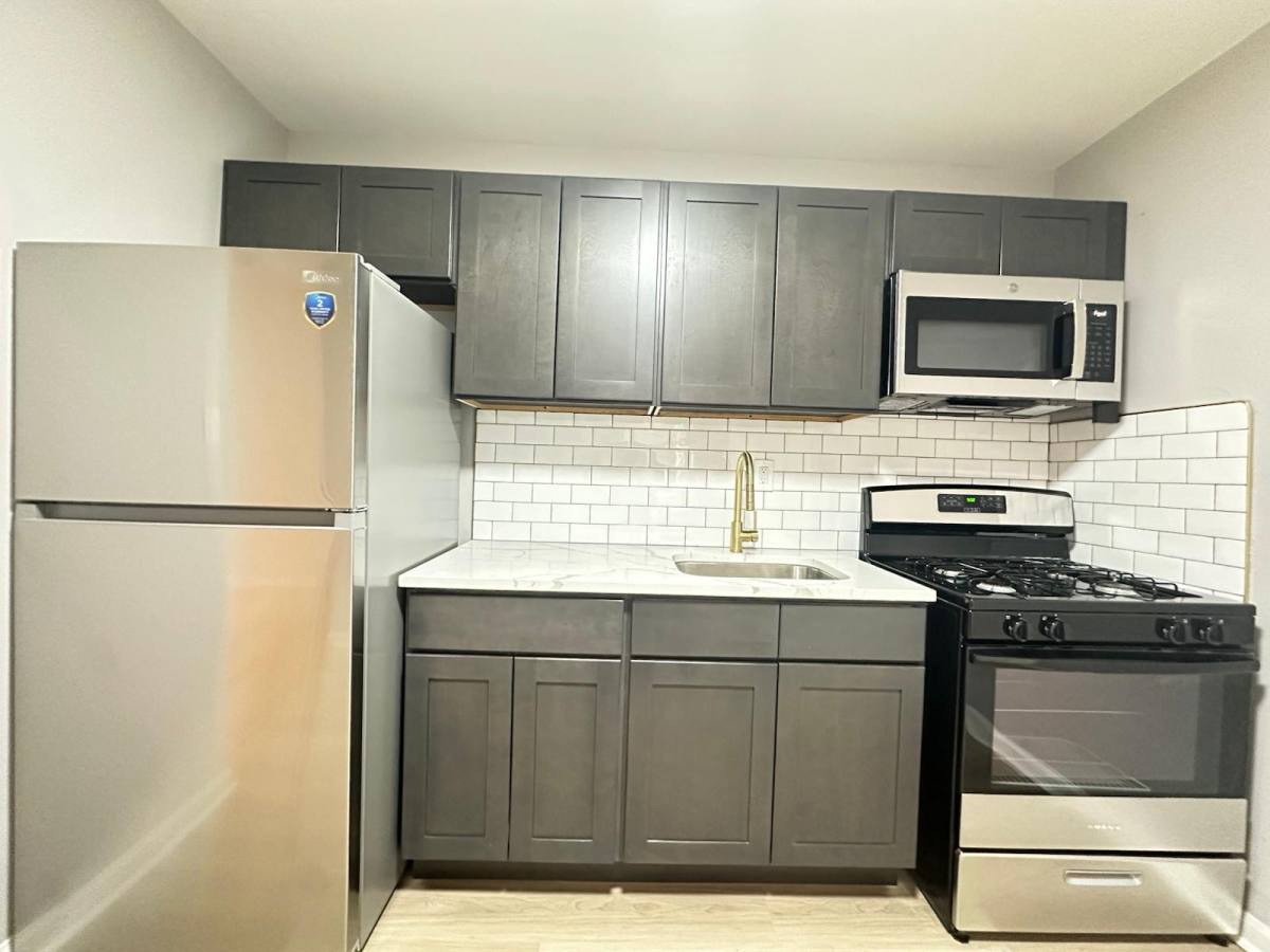 Townhouse for rent at 6121 Delancey St, Philadelphia, PA 19143