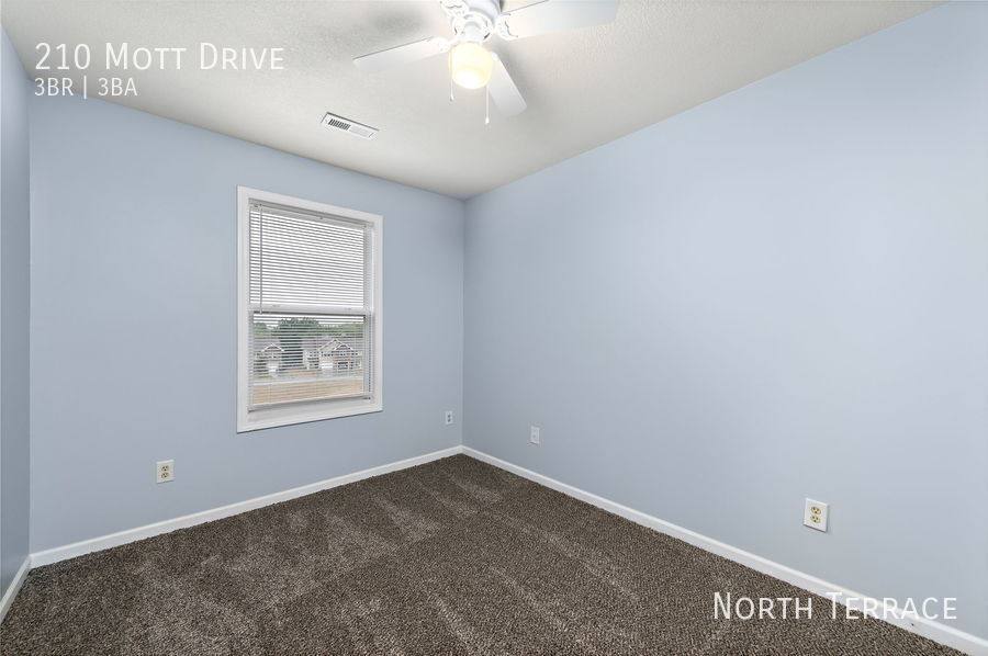 Townhouse for rent at 210 Mott Dr, Raymore, MO 64083