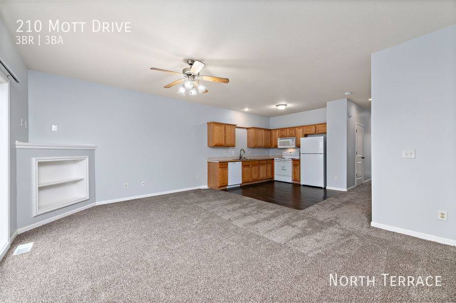Townhouse for rent at 210 Mott Dr, Raymore, MO 64083