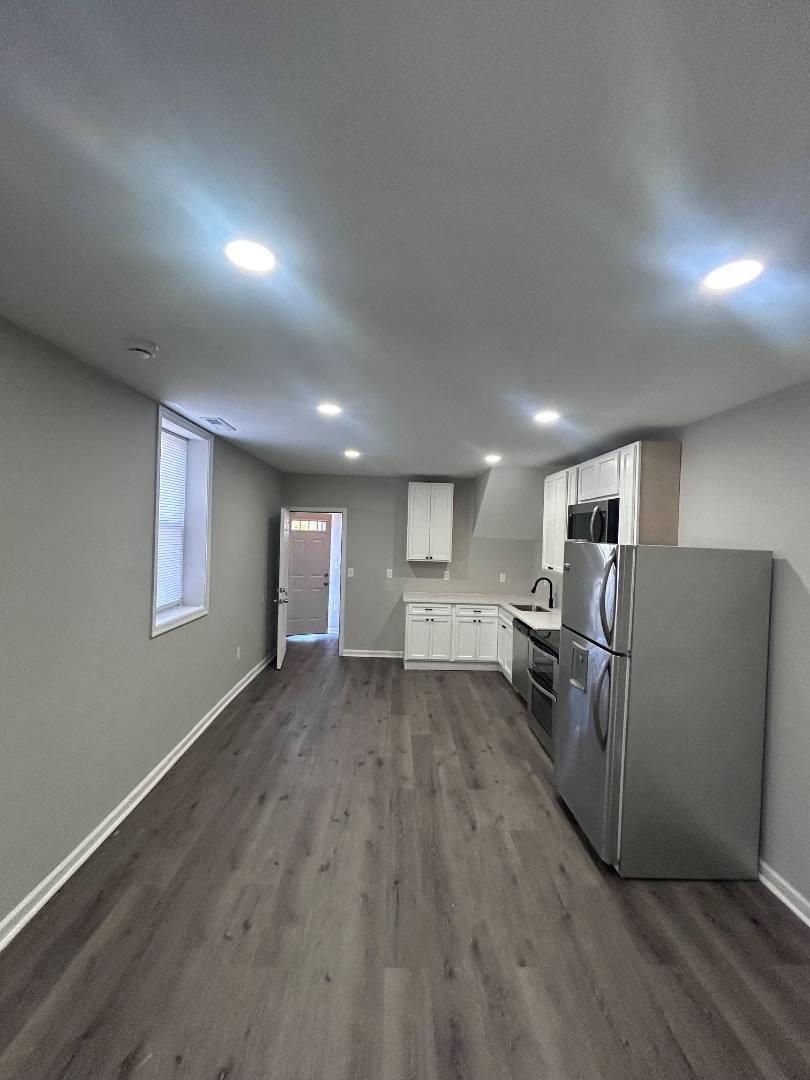 Apartment for rent at 1311 N Washington St #1, Baltimore, MD 21213