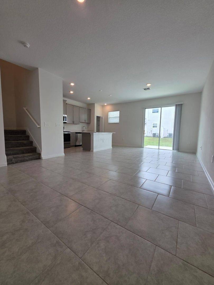 Townhouse for rent at 7732 Stone Creek Trail #LAKE Wilson Reserve, Kissimmee, FL 34747