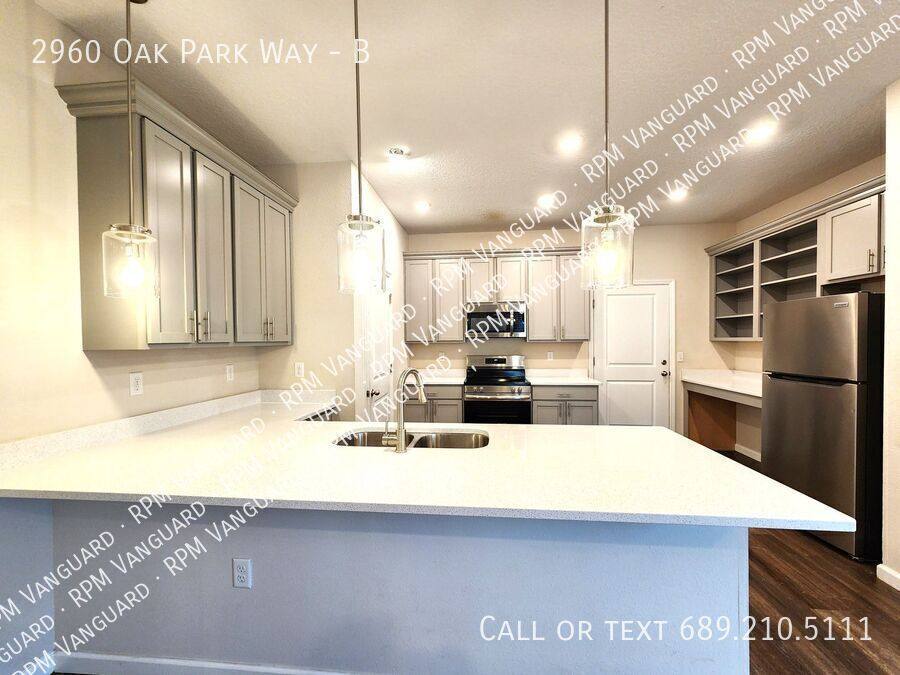 Townhouse for rent at 2960 Oak Park Way #B, Orlando, FL 32822