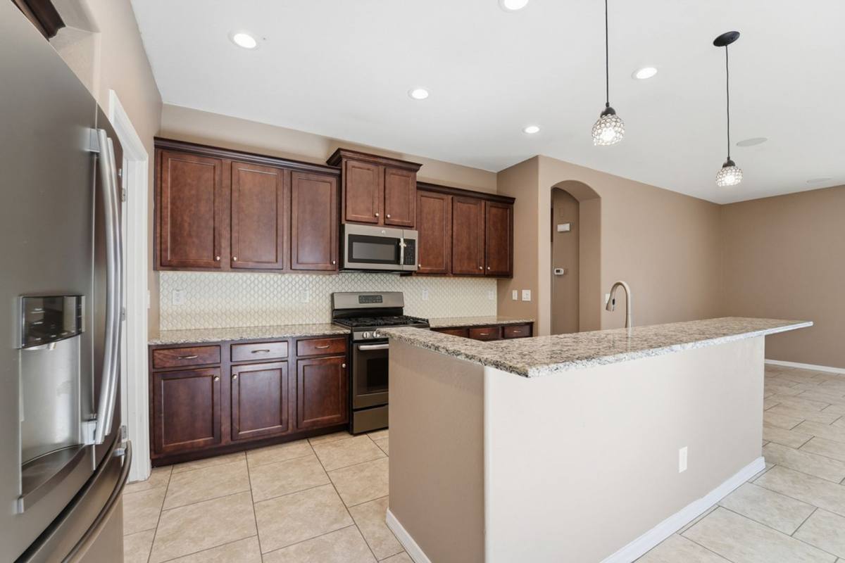 House for rent at 371 W Flame Tree Ave, San Tan Valley, AZ 85140