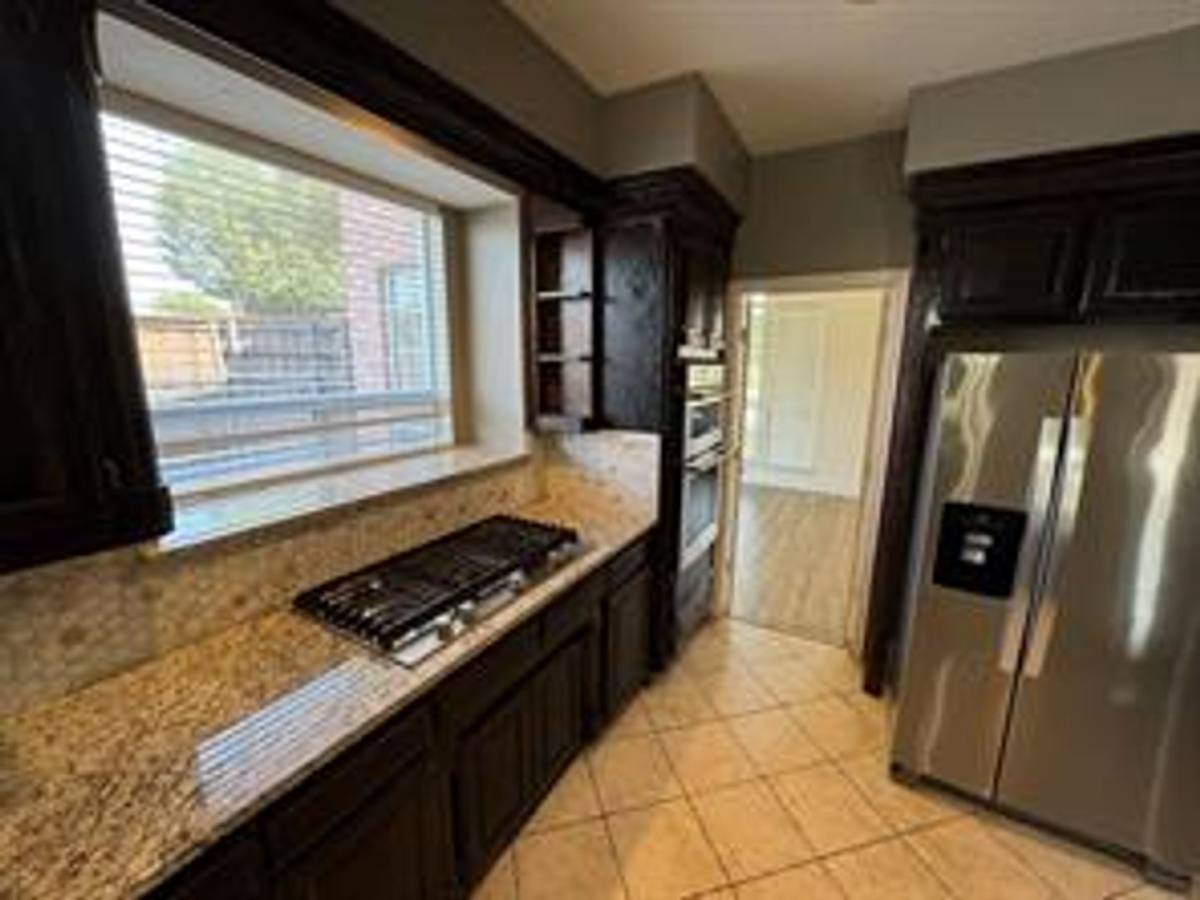 House for rent at 1100 Hunters Creek Dr, Carrollton, TX 75007