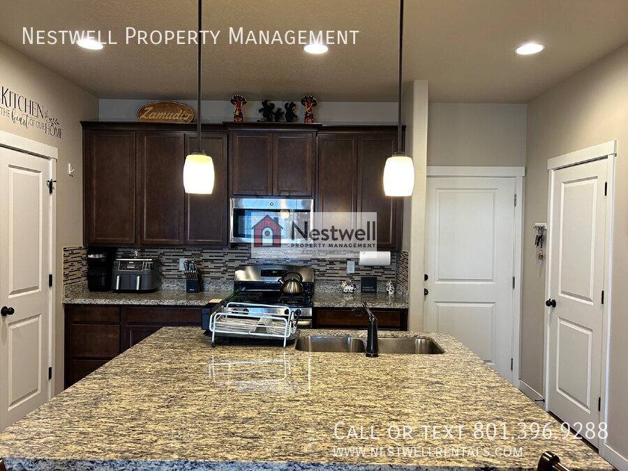 Townhouse for rent at 5696 W Red Ridge Lane, Salt Lake City, UT 84118