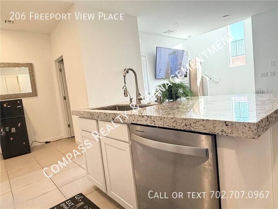 Townhouse for rent at 206 Freeport View Place, Henderson, NV 89011