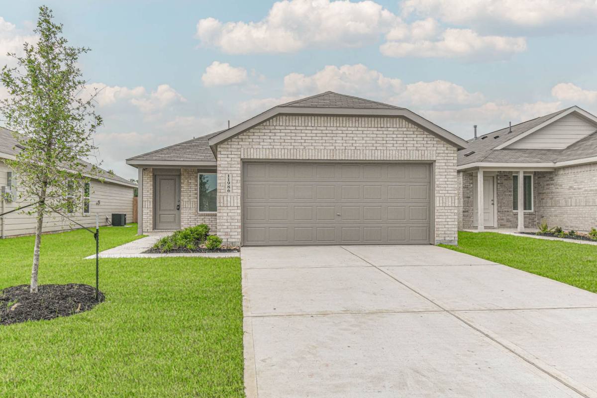 House for rent at 11986 Noble Wood Village Dr, Magnolia, TX 77354