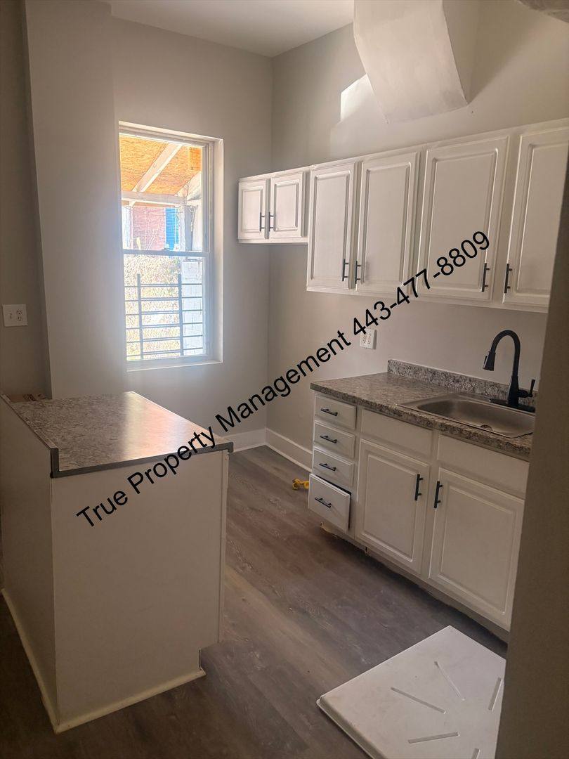 House for rent at 1722 N Monroe St, Baltimore, MD 21217