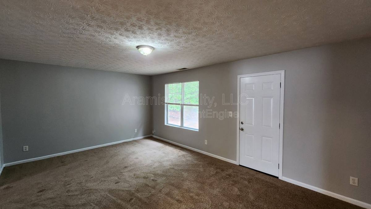 Townhouse for rent at 5749 Strathmoor Manor Circle, Lithonia, GA 30058