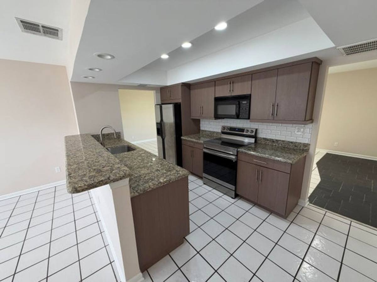 House for rent at 499 W Conference Dr, Boca Raton, FL 33486
