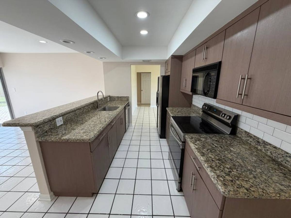 House for rent at 499 W Conference Dr, Boca Raton, FL 33486