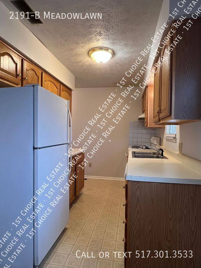 Townhouse for rent at 2191-B Meadowlawn, Holt, MI 48842