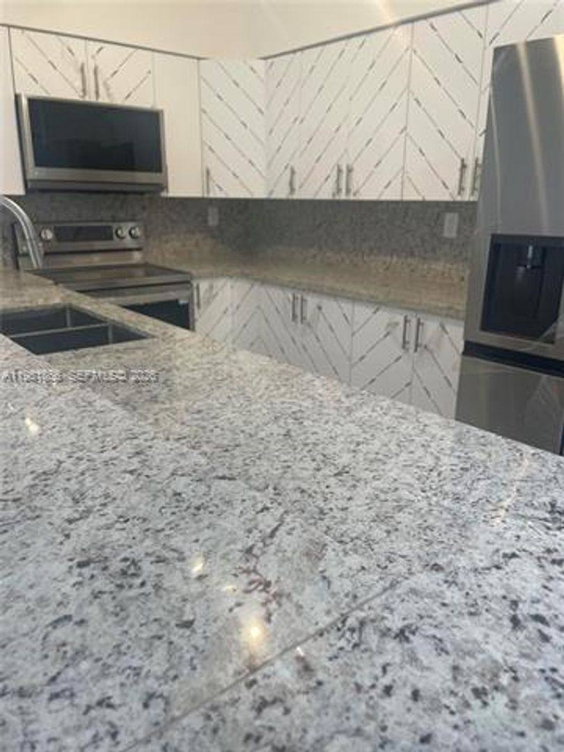 Townhouse for rent at 14728 Balgowan Rd Th, Hialeah, FL 33016