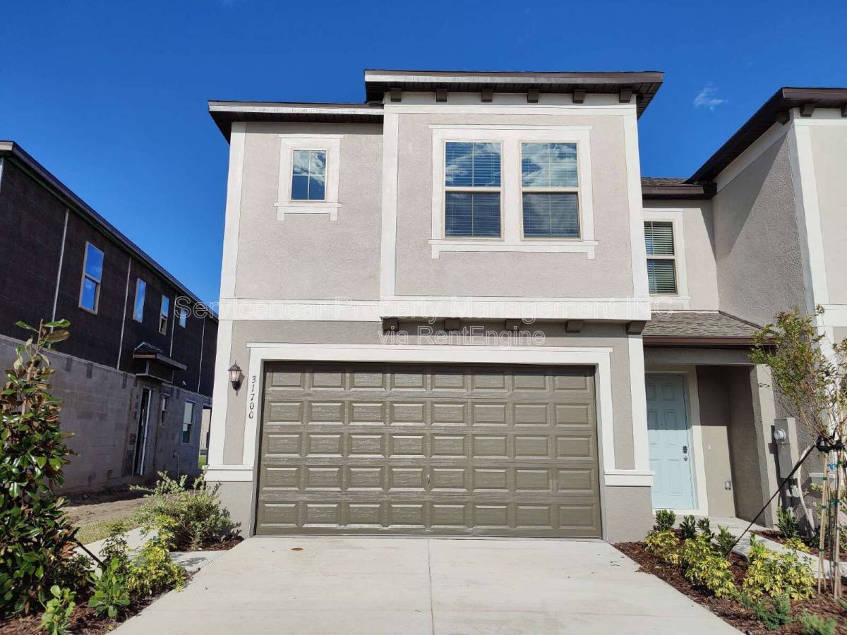 Townhouse for rent at 31700 Blue Passing Loop, Wesley Chapel, FL 33545