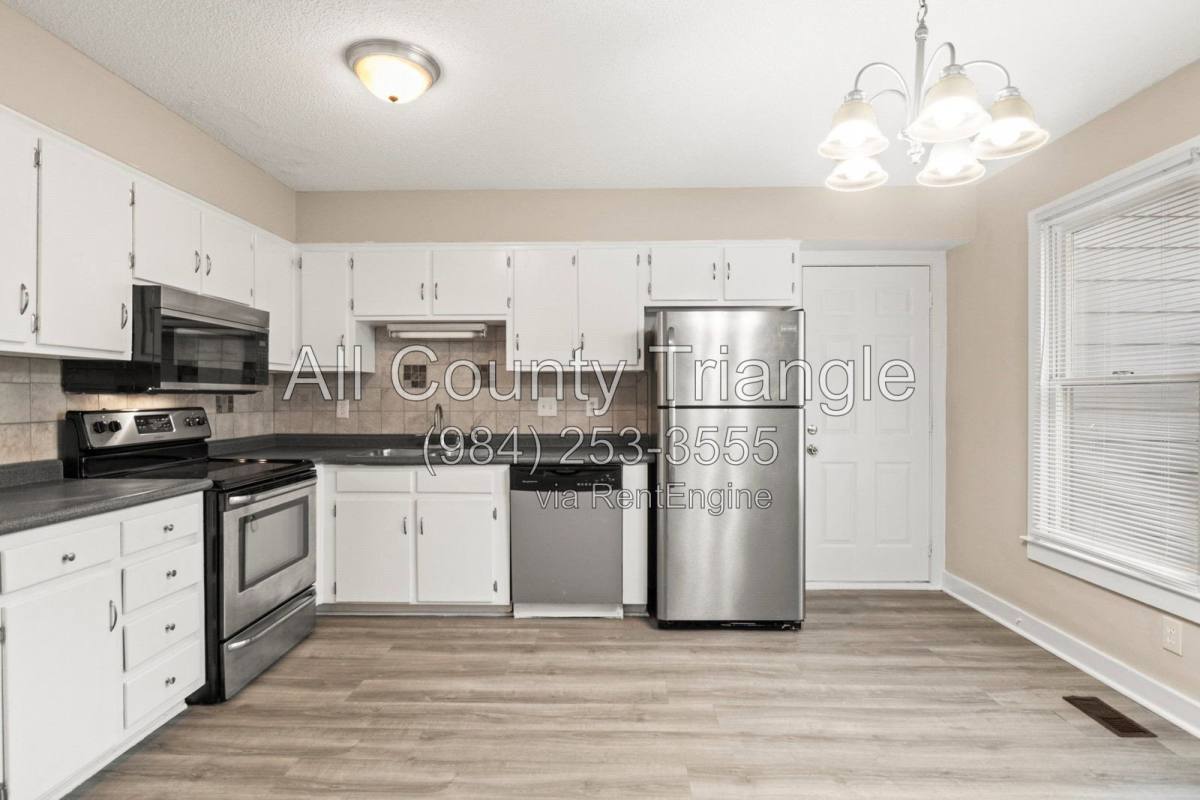 Townhouse for rent at 1619 Budwood Dr, Raleigh, NC 27609