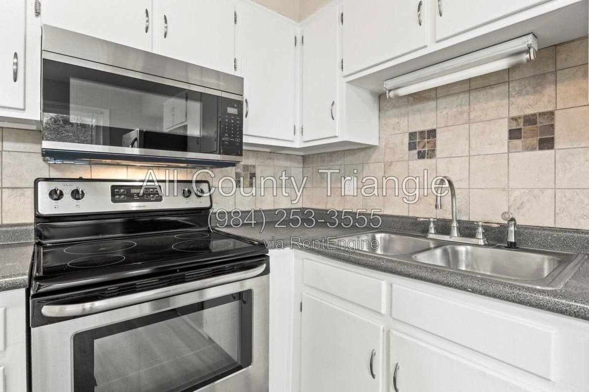 Townhouse for rent at 1619 Budwood Dr, Raleigh, NC 27609