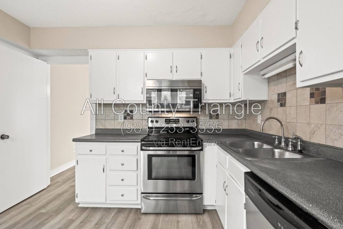 Townhouse for rent at 1619 Budwood Dr, Raleigh, NC 27609