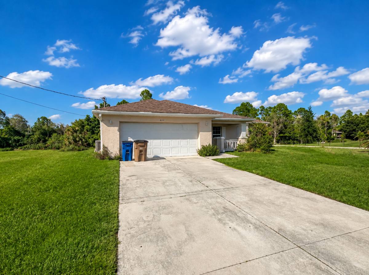 House for rent at 409 La Perouse St, Lehigh Acres, FL 33974