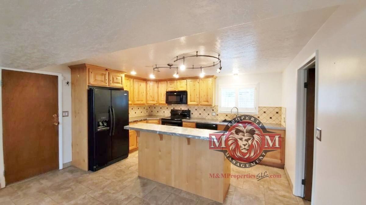 House for rent at 1478 W Teakwood Dr, Salt Lake City, UT 84123