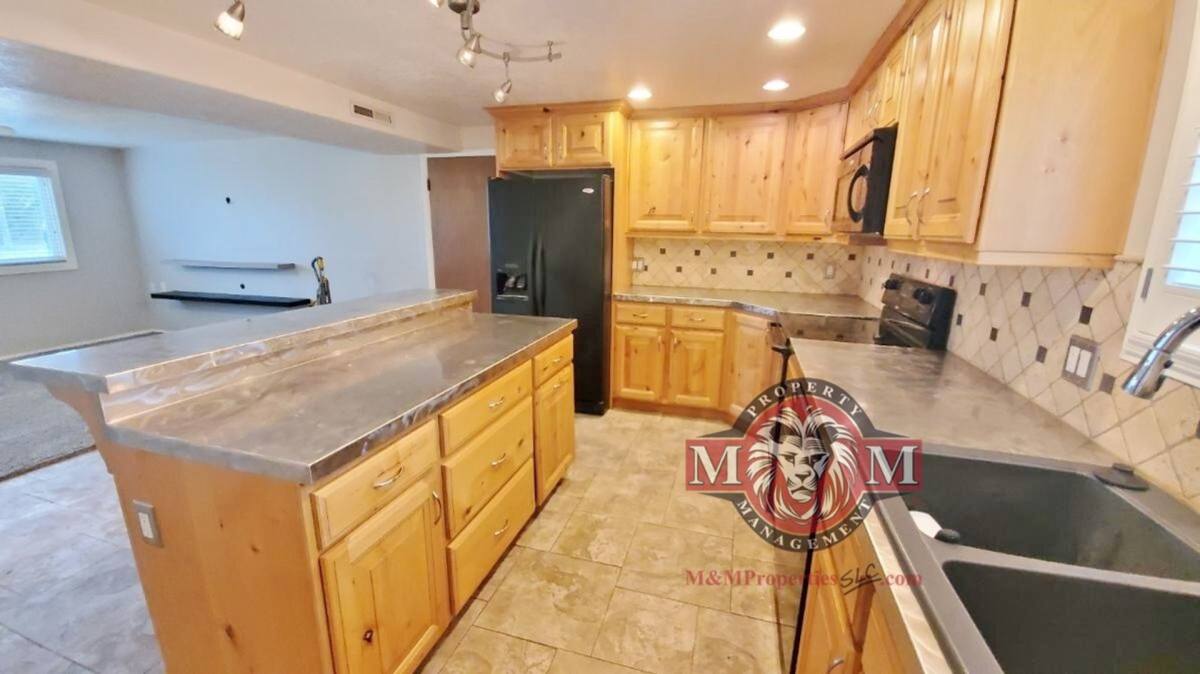 House for rent at 1478 W Teakwood Dr, Salt Lake City, UT 84123
