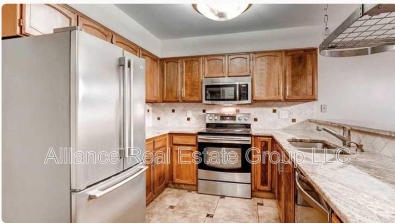 Townhouse for rent at 10015 E Mexico Ave #1, Denver, CO 80247