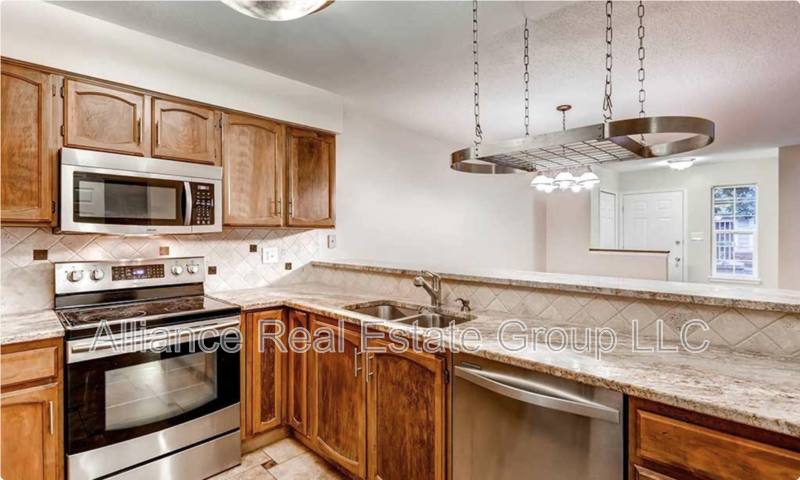 Townhouse for rent at 10015 E Mexico Ave #1, Denver, CO 80247