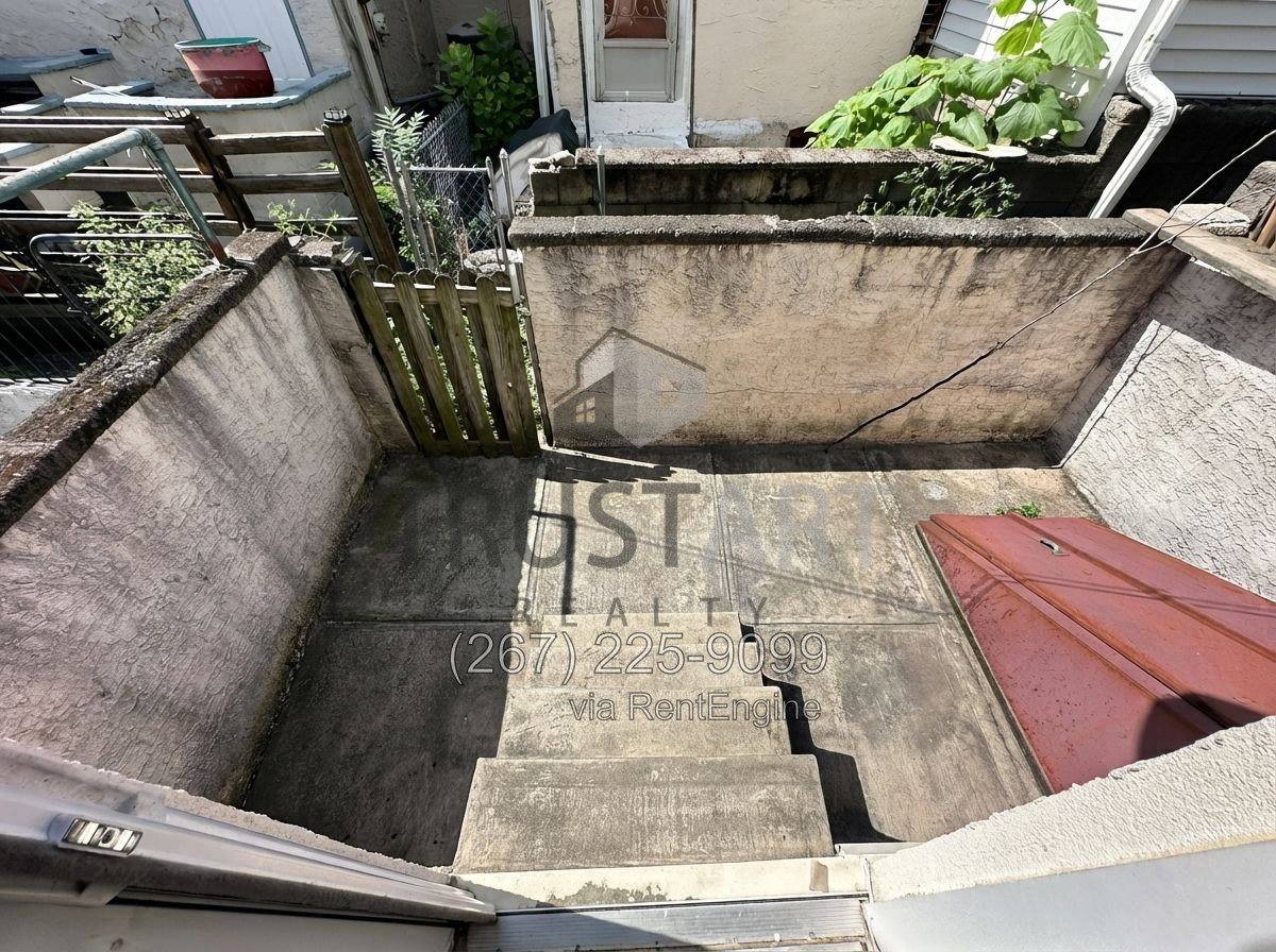 Townhouse for rent at 2202 S Woodstock St, Philadelphia, PA 19145