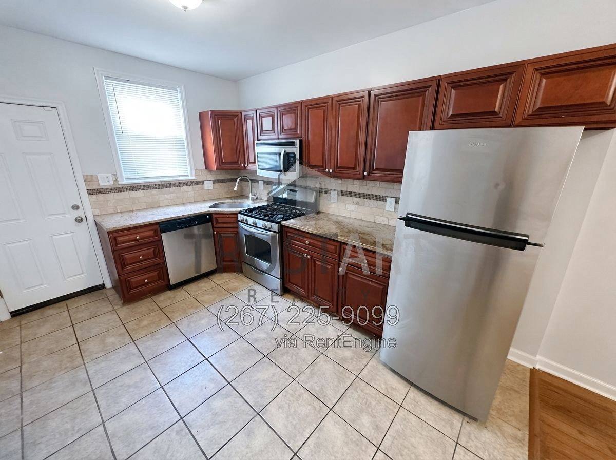 Townhouse for rent at 2202 S Woodstock St, Philadelphia, PA 19145