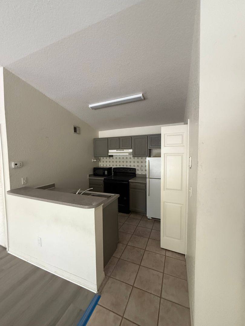 Condo for rent at 8939 Latrec Ave #1-305, Orlando, FL 32819