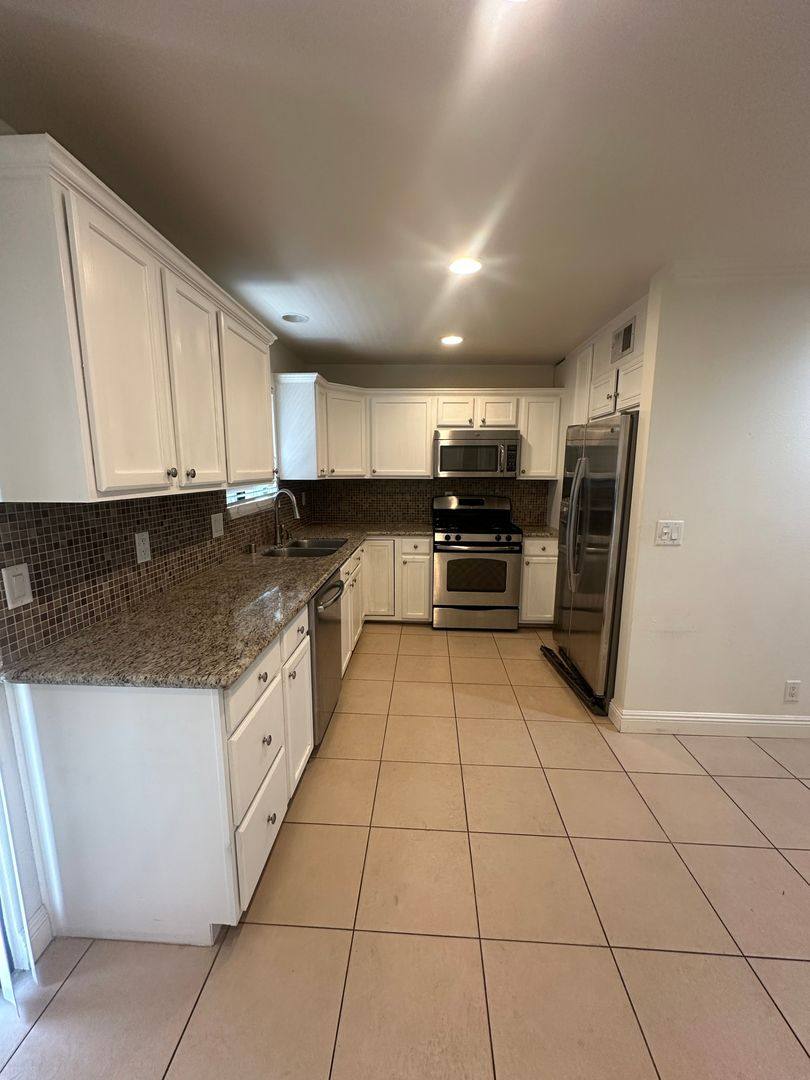 Townhouse for rent at 22865 Del Valle St, Woodland Hills, CA 91364
