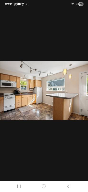 1410 1/2 E Ash Ave, Coeur d'Alene, ID 83814 - House for Rent - Image 2