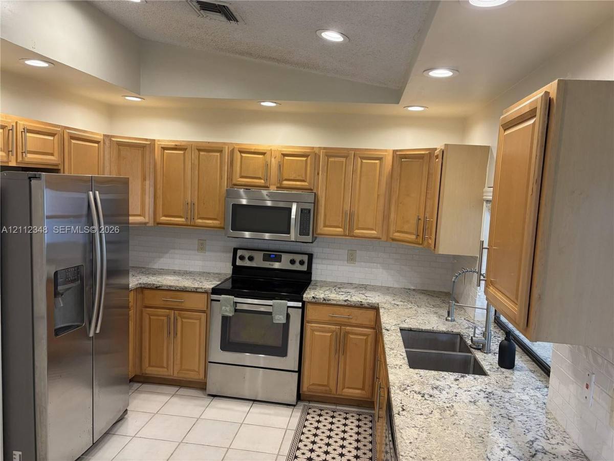 House for rent at 1410-1412 NW 93rd Terrace, Coral Springs, FL 33071