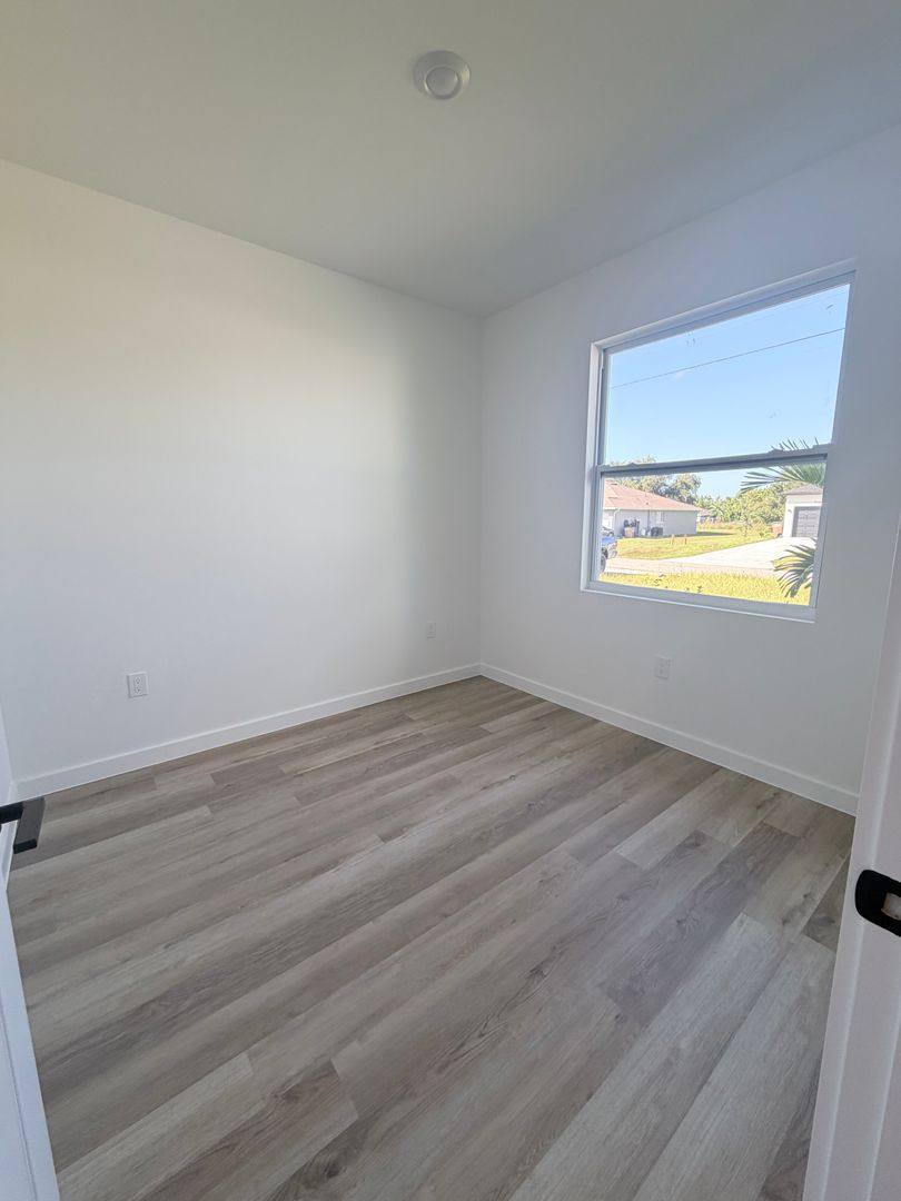 717-719 Gordon Ave S, Lehigh Acres, FL 33973 - Apartment for Rent - Image 3