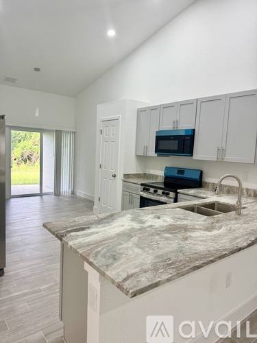 4753 26th St SW, Lehigh Acres, FL 33973 - House for Rent - Image 6