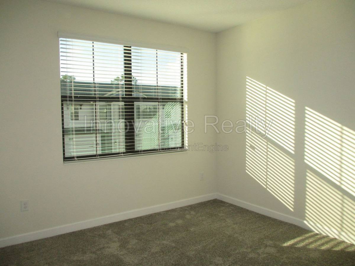 11091 Whistling Pine Way, Orlando, FL 32832 - Townhouse for Rent - Image 17