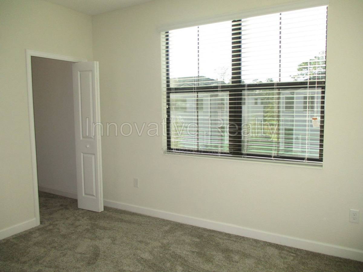 11091 Whistling Pine Way, Orlando, FL 32832 - Townhouse for Rent - Image 18
