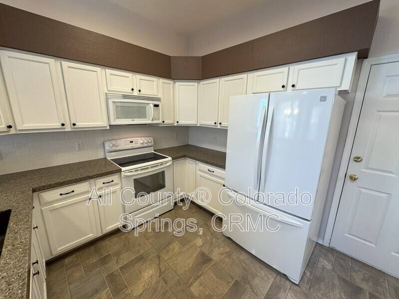 6838 Los Reyes Circle, Colorado Springs, CO 80918 - Townhouse for Rent - Image 7