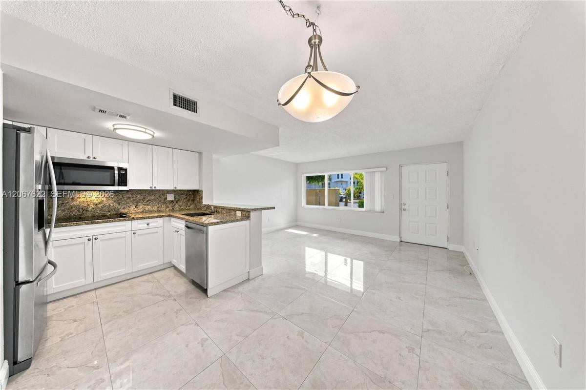 Townhouse for rent at 670 NW 85th Place, Miami, FL 33126